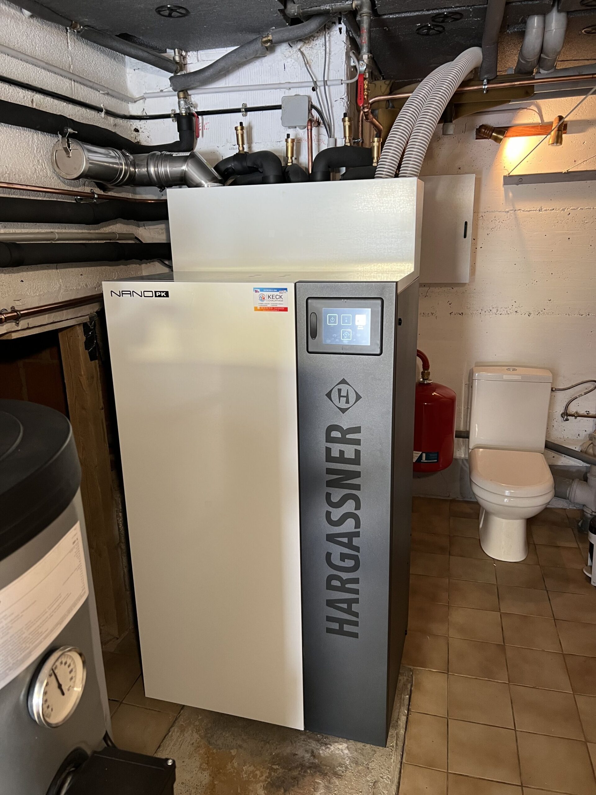 Installation d’une chaudi&egrave;re pellets Hargassner avec Un silo textile en remplacement d’une chaudi&egrave;re fioul sur Diemeringen Forbach